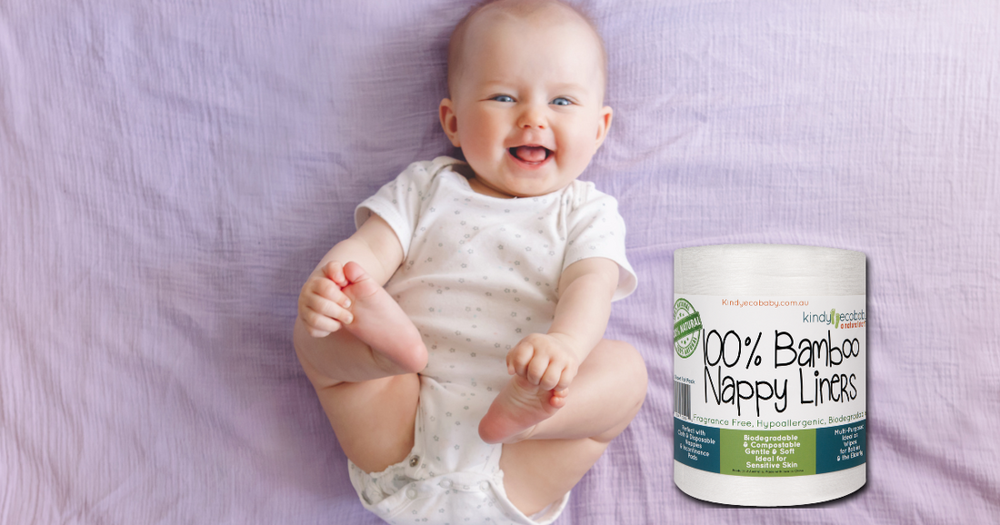 laughing baby with bamboo nappy liner roll