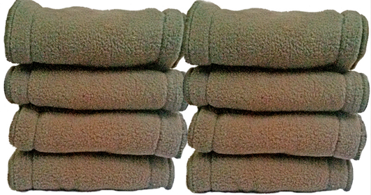 Bamboo and microfiber cloth nappy inserts prepared for washing to improve absorbency.