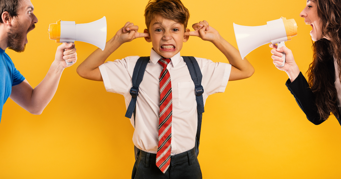 mom and dad using loud hailers to should at school boy who has his fingers in his ears