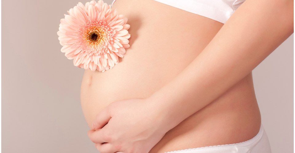 preganant belly with flower