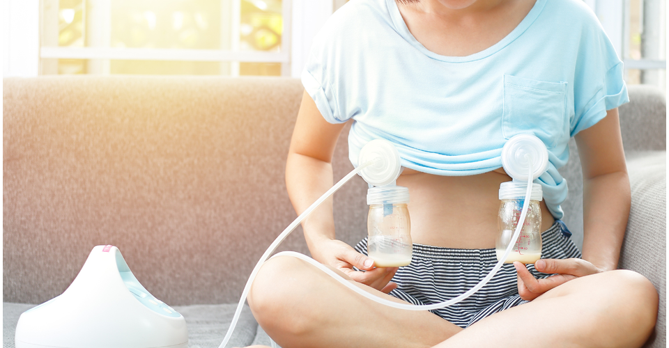 Breastfeeding mother relaxing in a comfortable chair, illustrating healthy feeding routines