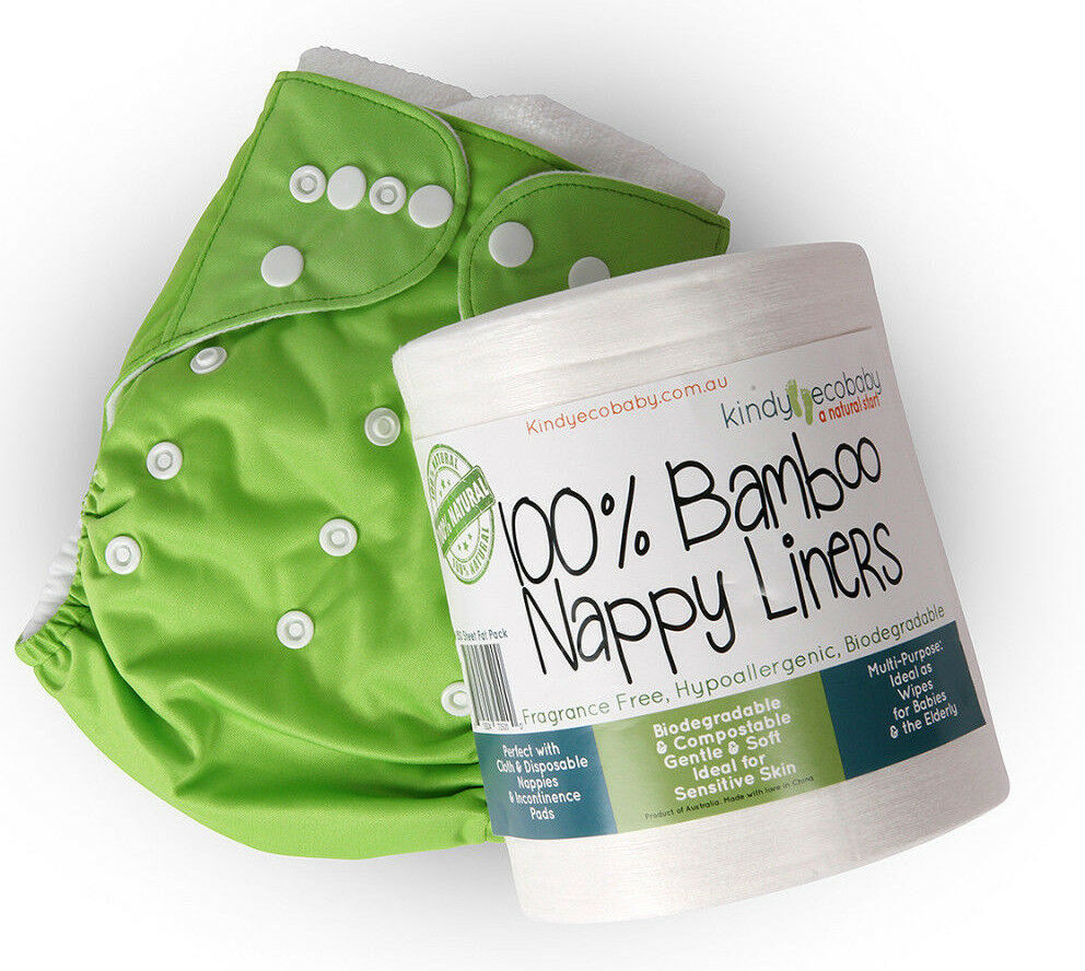 Green bamboo nappy and packaging on a white background